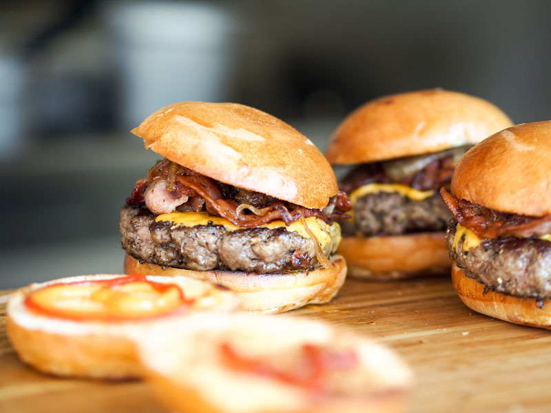 close-up of three burgers