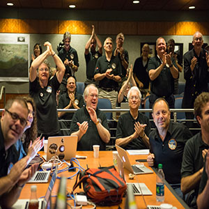 Part of the New Horizons team celebrating the spacecraft's flyby of Pluto.